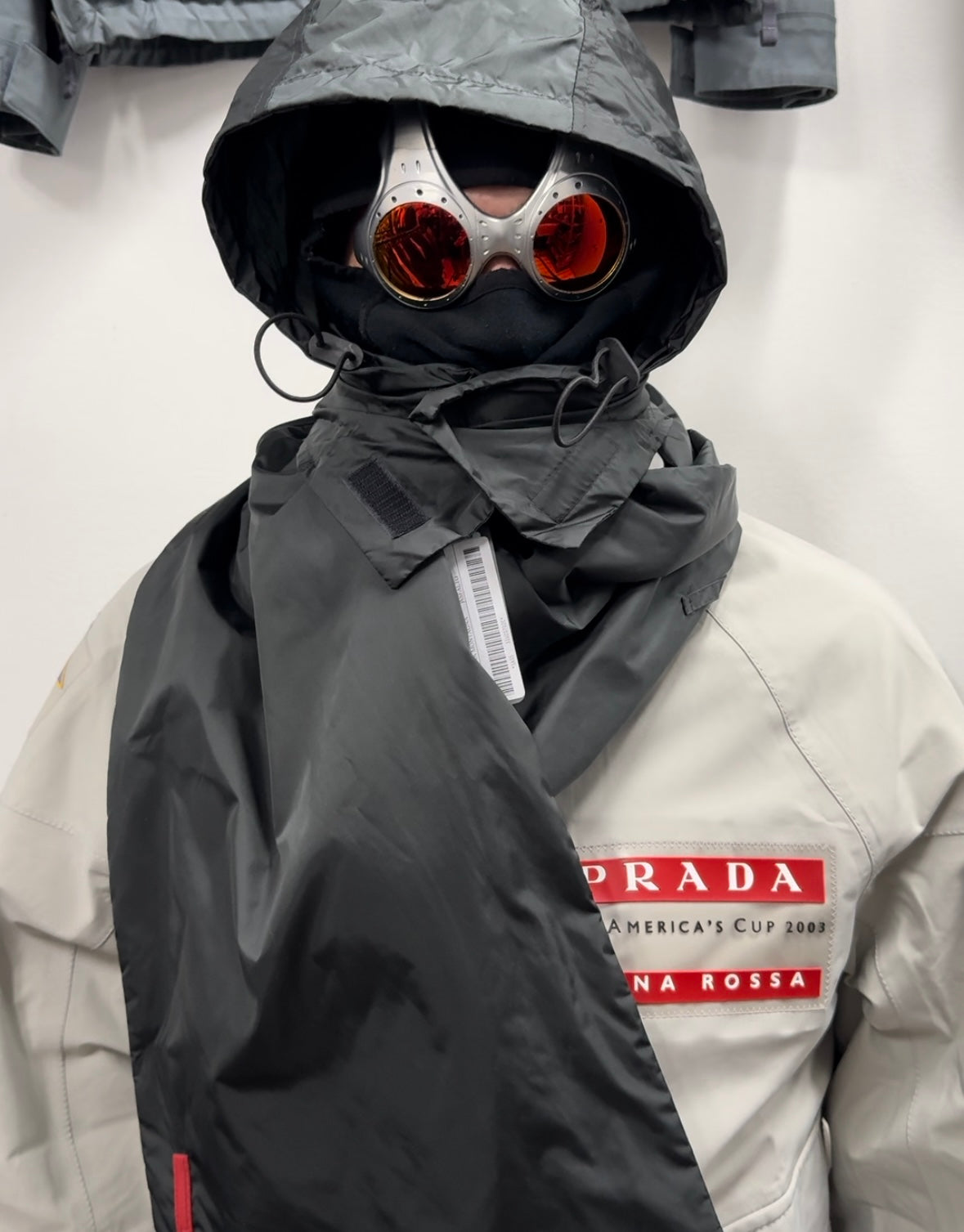 Prada Sport Technical Scarf with Concealed Hood – 300700