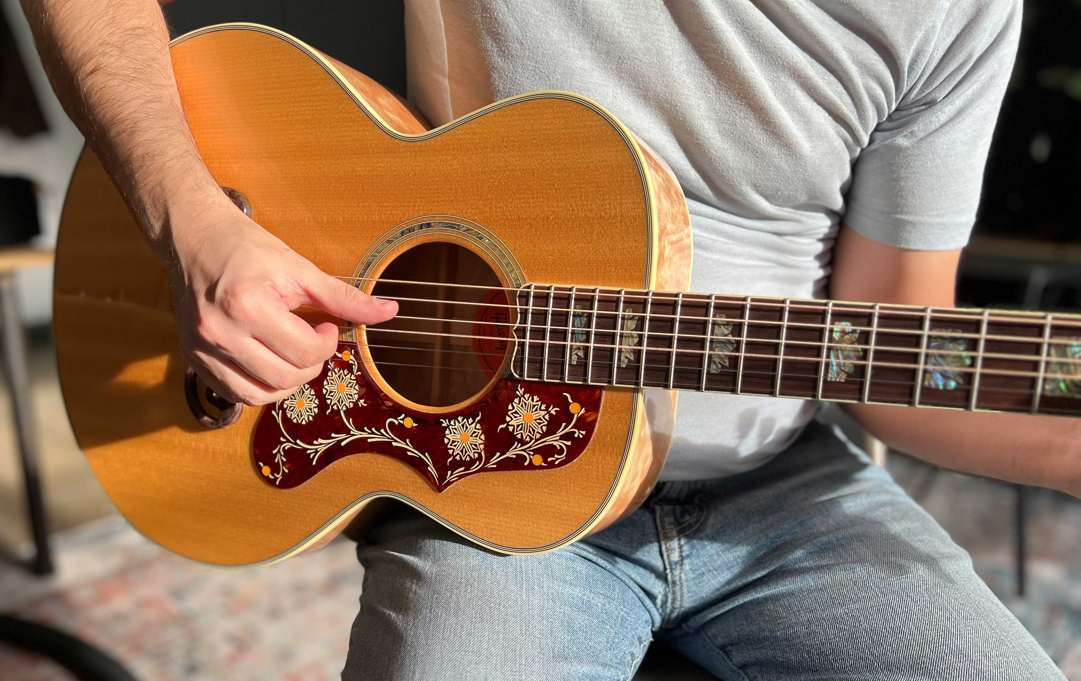 A Gibson Custom Shop J-200M Trophy Quilt Acoustic Guitar With
