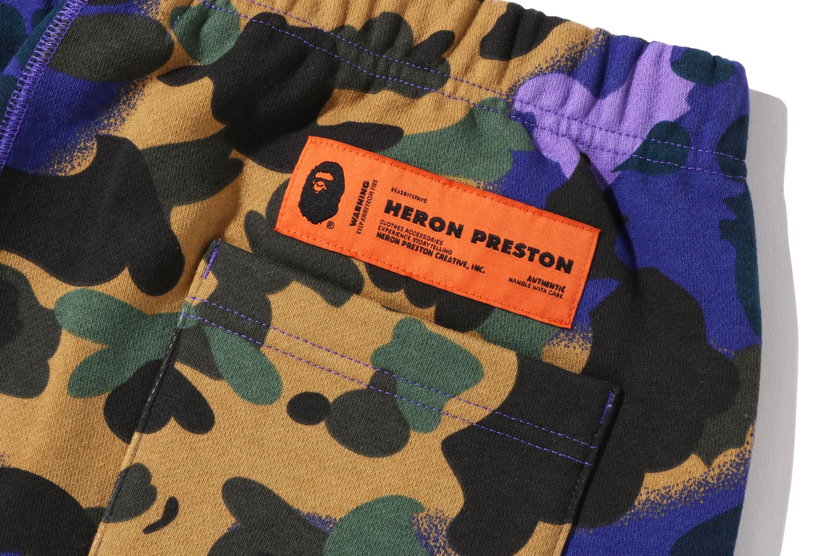 A BATHING APE® X Heron Preston Mix 1st Camo Sweat Pants | Bape