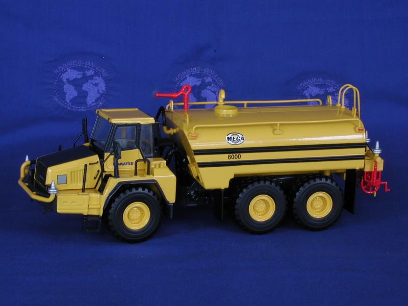 Buffalo Road Imports. Komatsu HM400 with Mega water tank