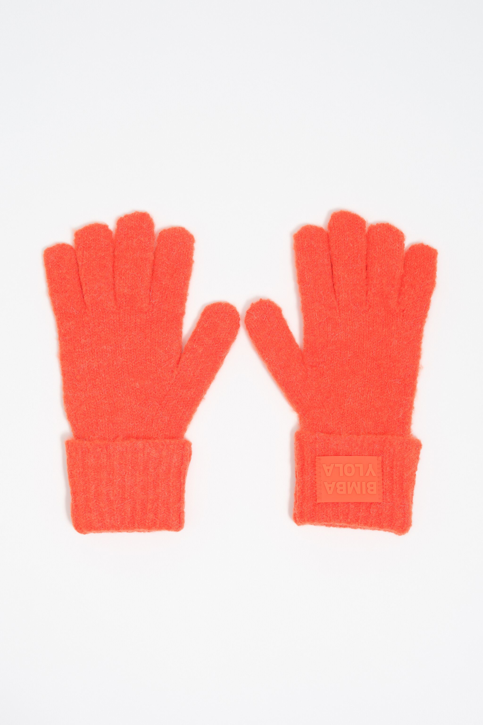 Orange knit gloves