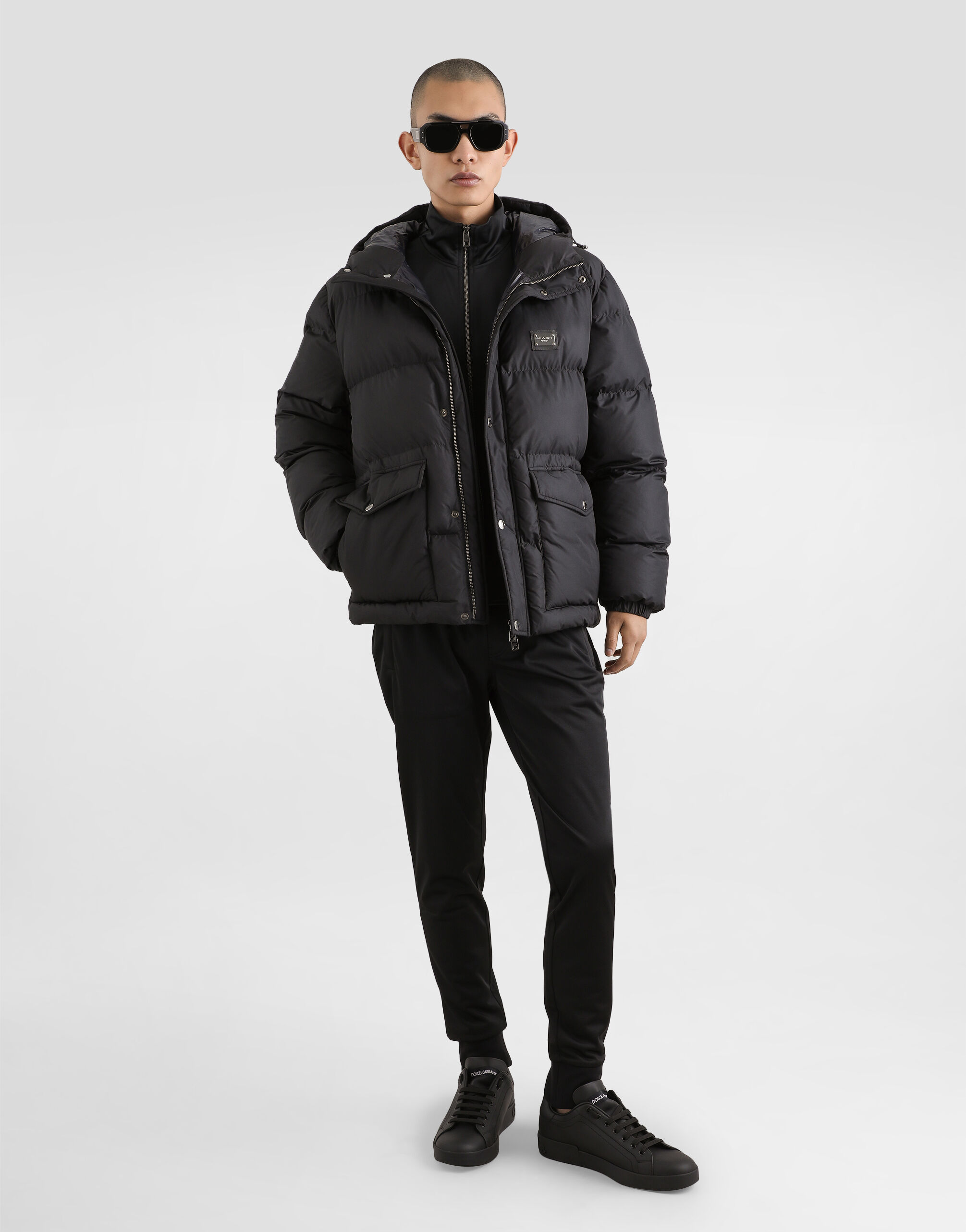 Nylon down jacket with hood and branded tag in Black for Men