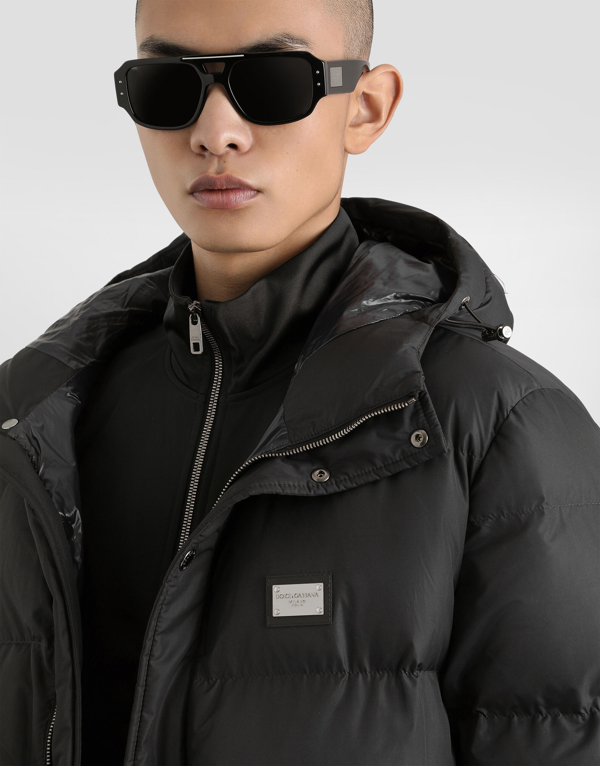 Nylon down jacket with hood and branded tag in Black for Men