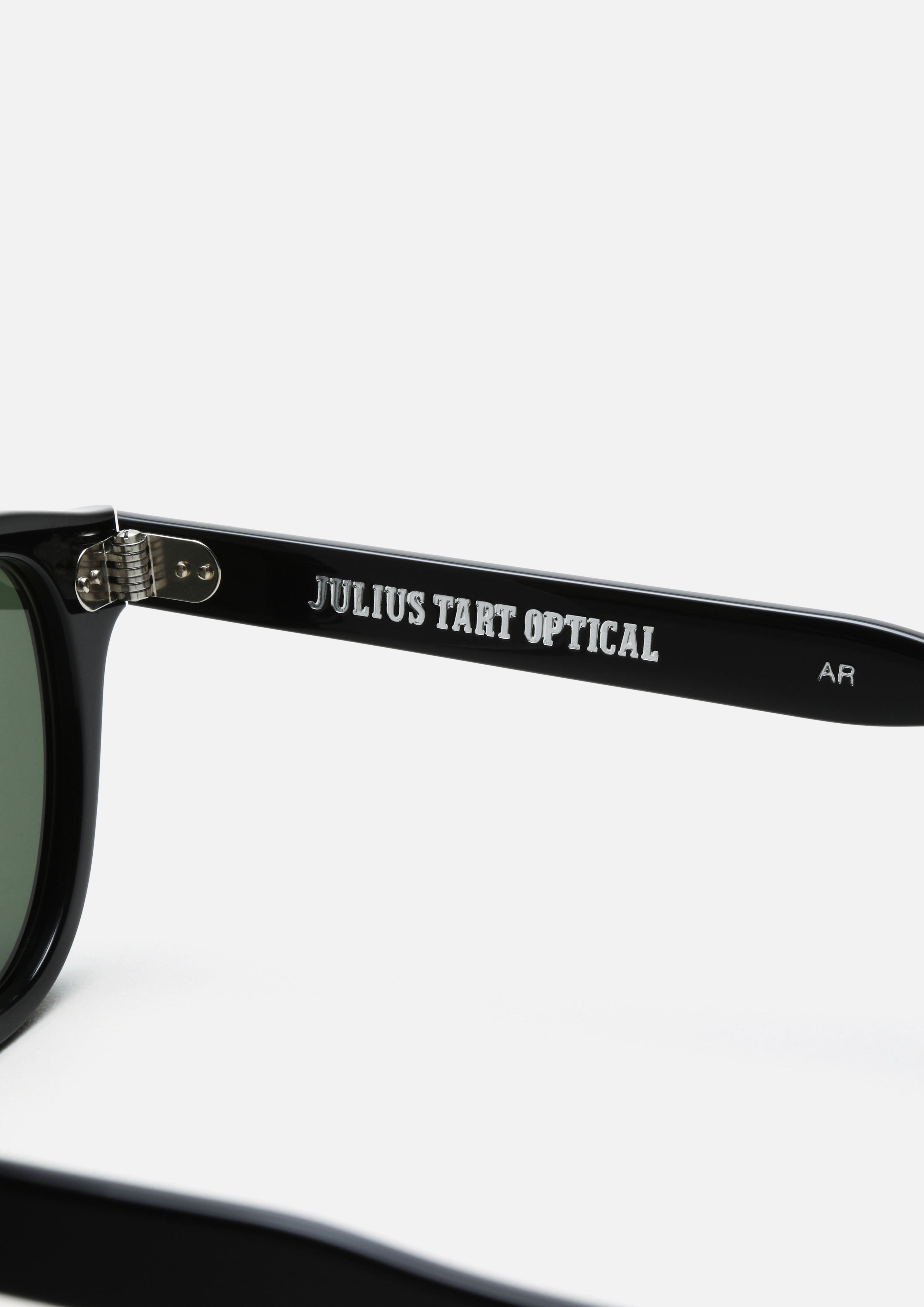 NH X JULIUS TART OPTICAL . AR