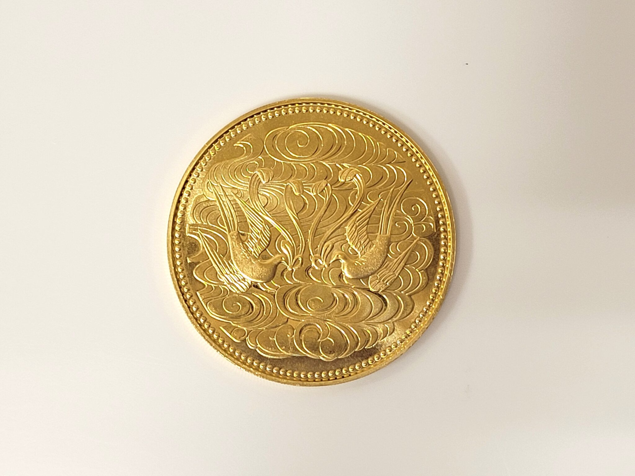 天皇陛下御在位60年 10万円金貨】 金貨の買取価格についてご紹介