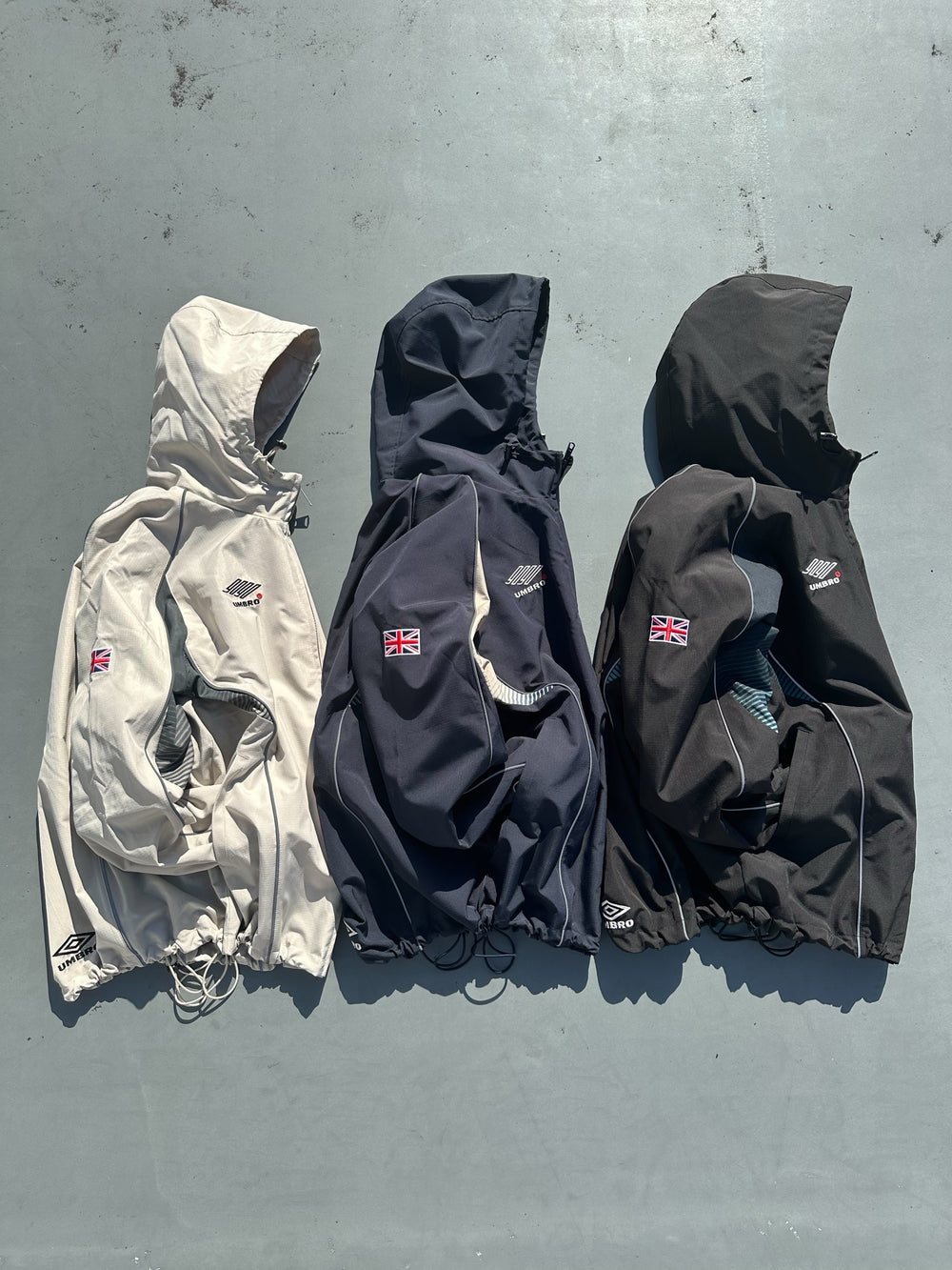 9090 × umbro Gradation Nylon Hooded Jacket – YZ