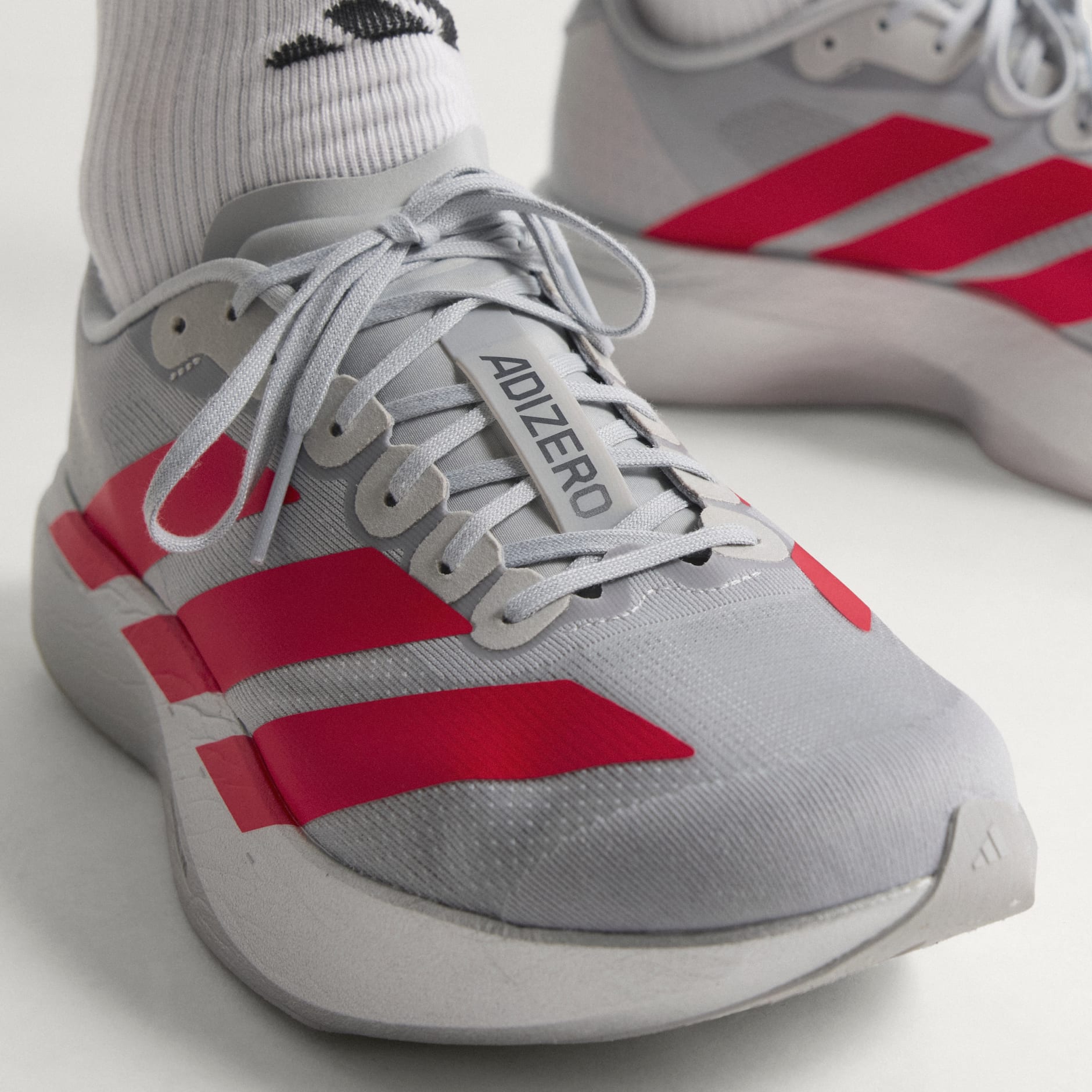 Shoes - Adizero EVO SL Shoes - Silver | adidas Oman