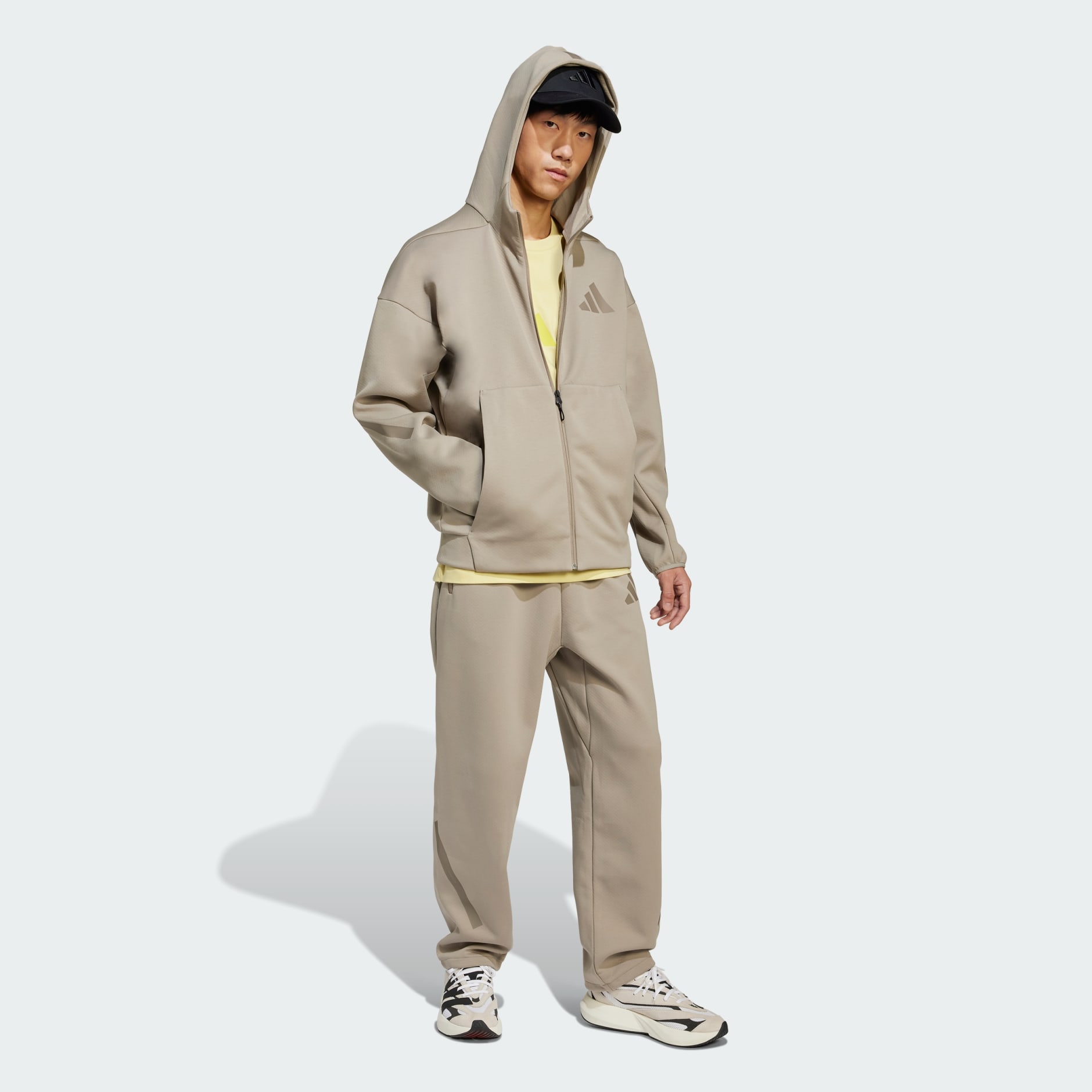 Clothing - adidas Z.N.E. Open-Hem Pants - Beige | adidas Oman