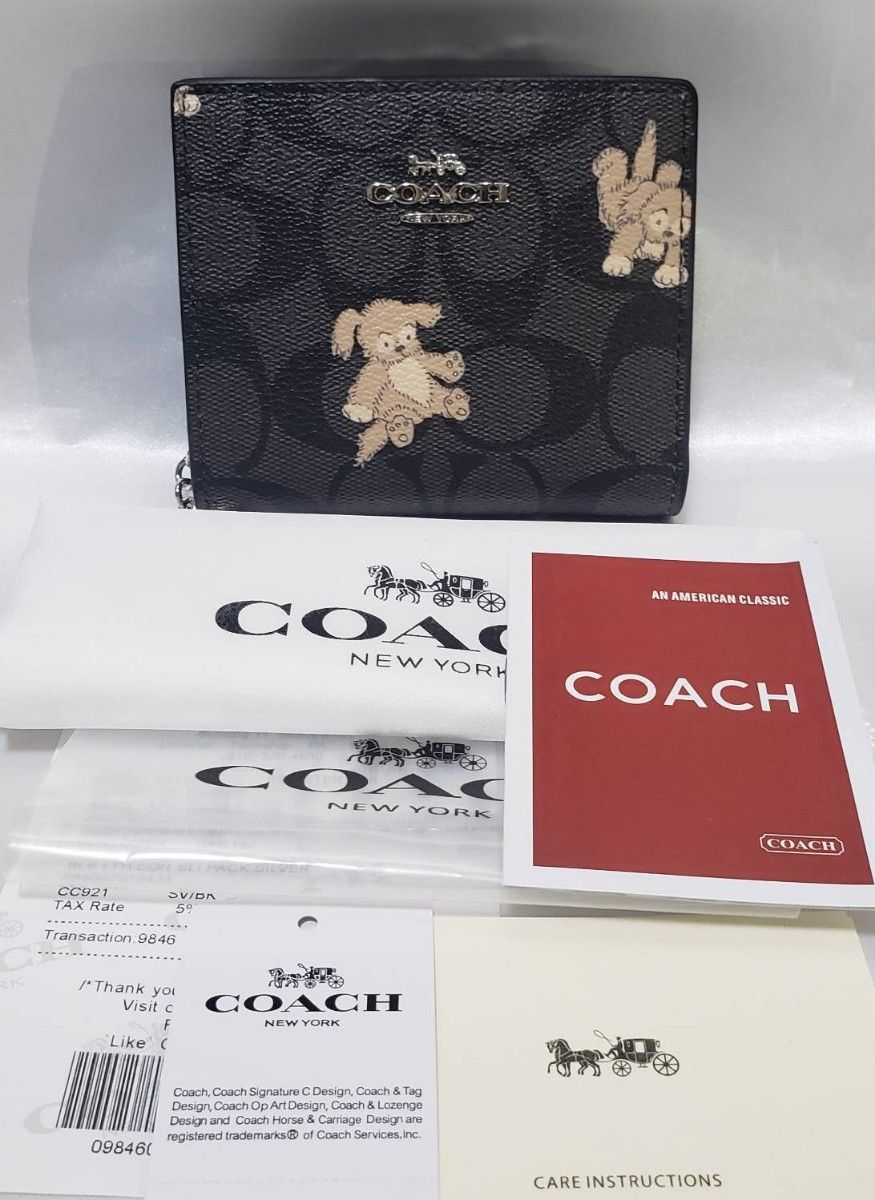 COACH コーチ シグネチャー ハッピー ドッグ プリント 二つ折り財布