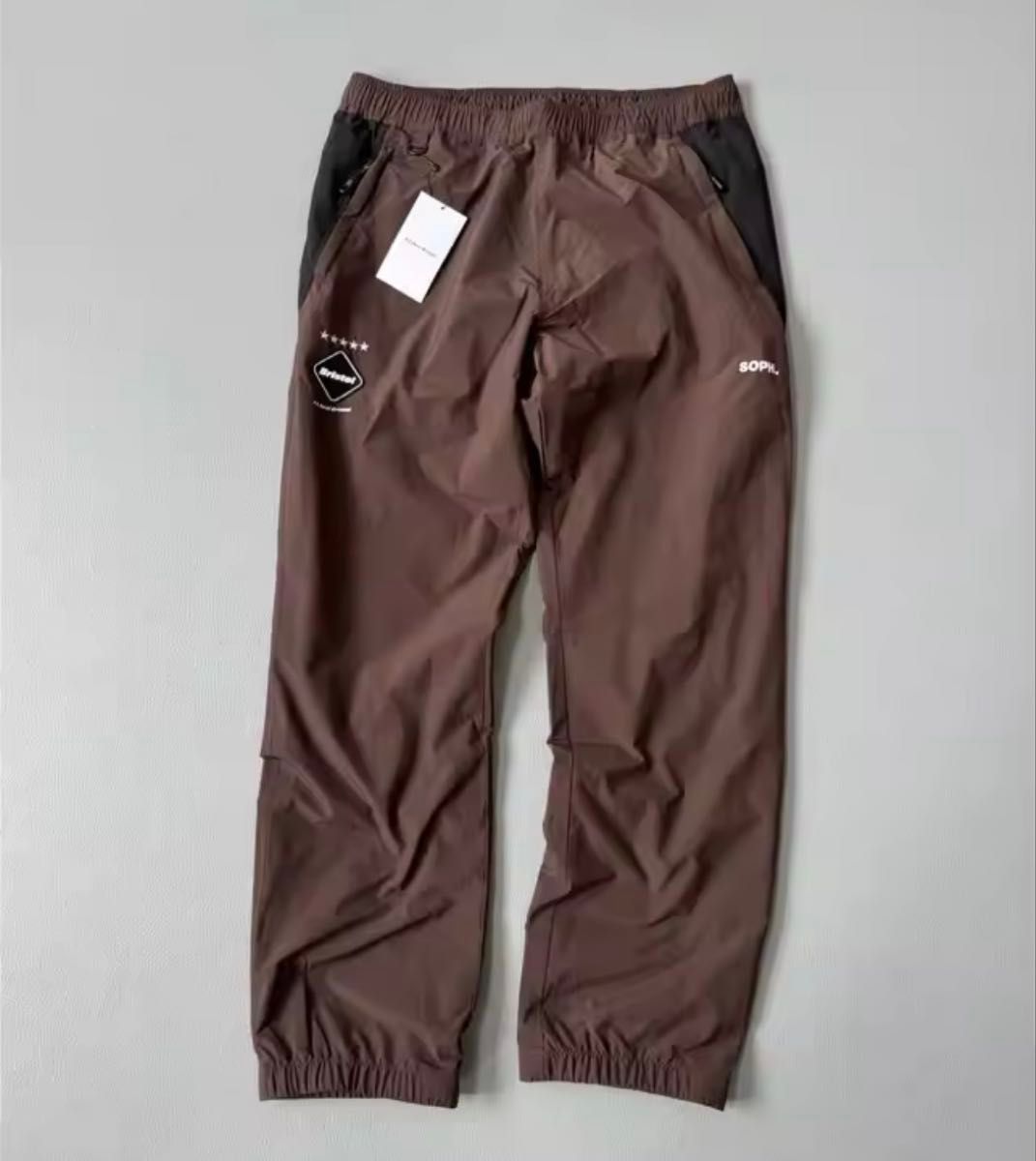 新品未着用】FCRB ウォームアップパンツ メンズ(L)ダークブラウン SOPH