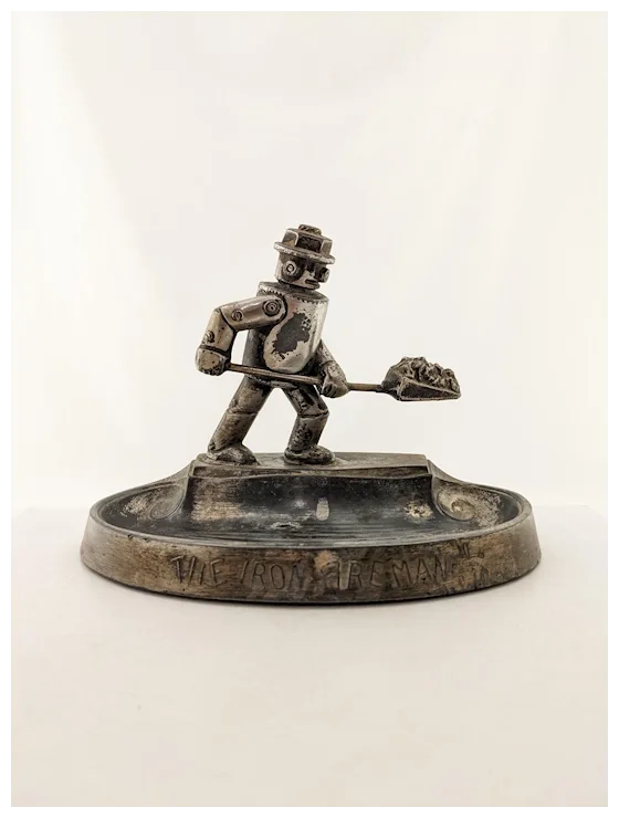 1920's Iron Fireman Ashtray (1). For Sale at Ruby Lane