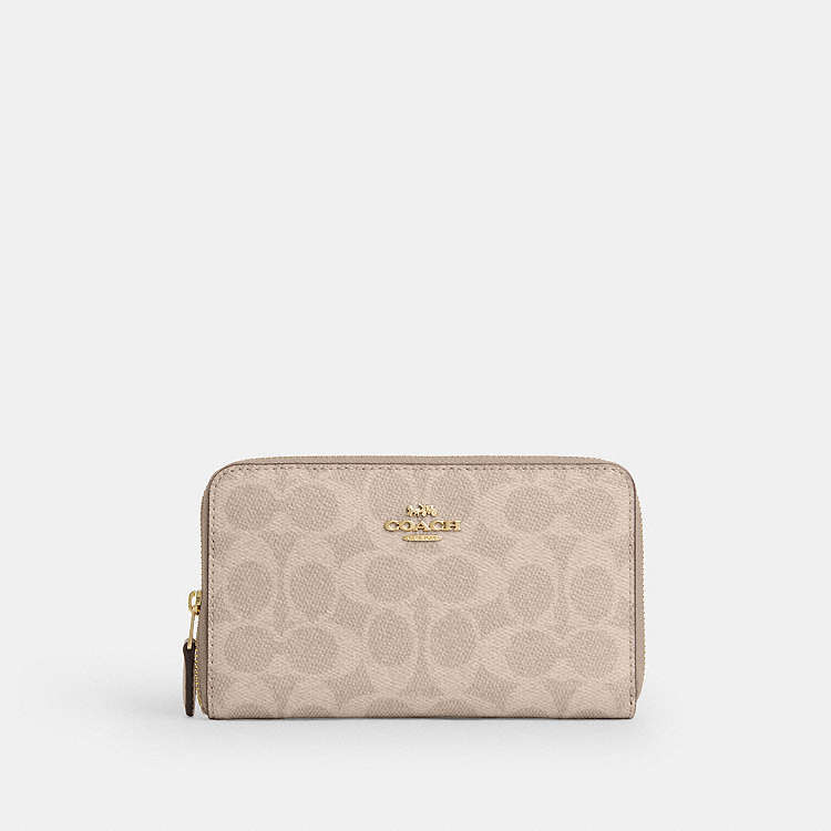 COACH® Outlet | Medium Id Zip Wallet In Signature Canvas