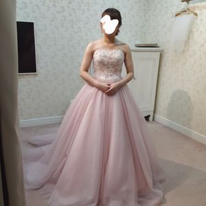 春にぴったりの桜色ドレス。薄ピンクのシンプルなカラードレス