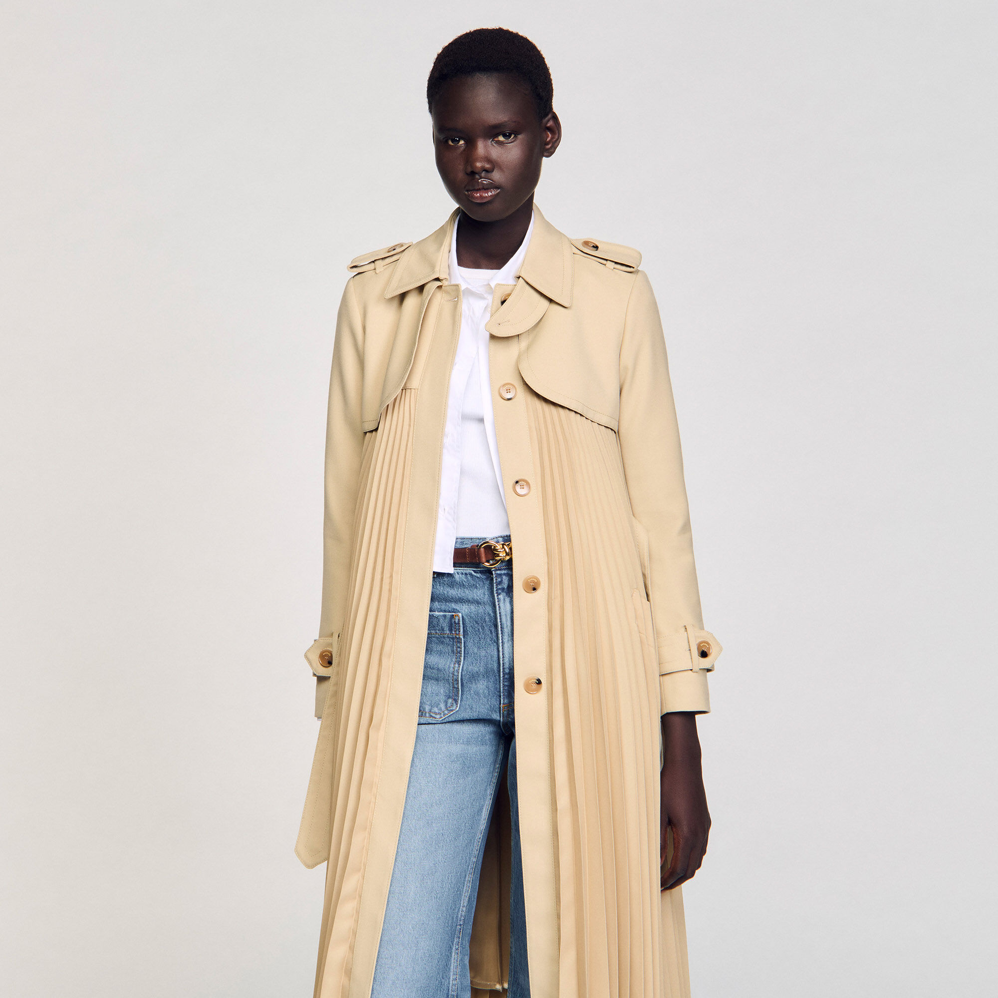 Pleated trench coat with belt white / beige For Women | Sandro Paris