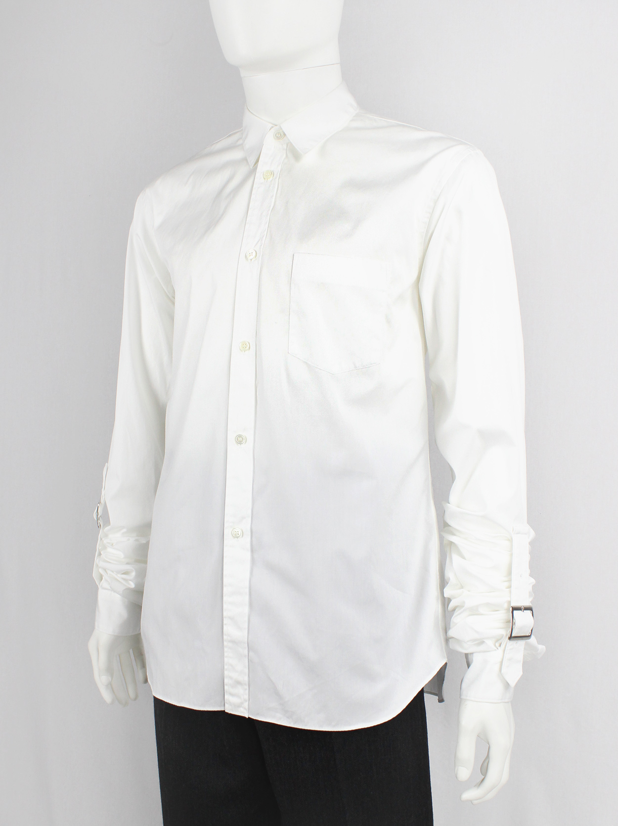 Comme des Garçons Shirt white shirt with belt straps across the