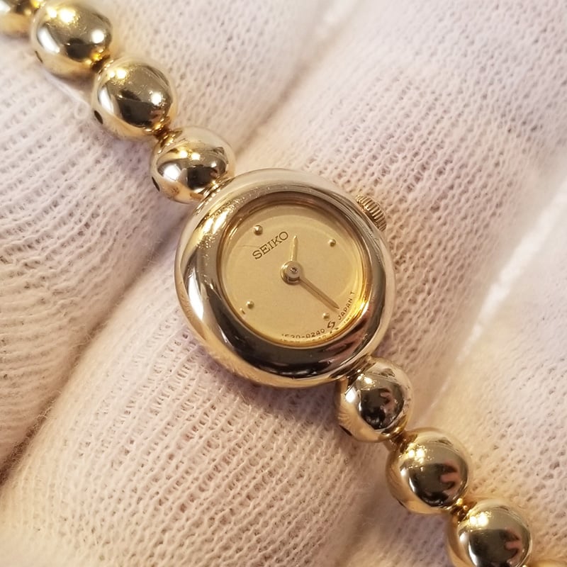 SEIKO セイコー レディース腕時計 ゴールド クォーツ 1E20-0070 不動