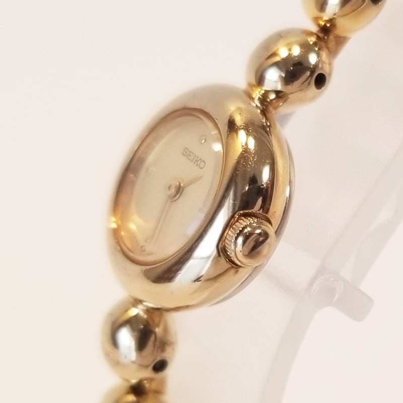 SEIKO セイコー レディース腕時計 ゴールド クォーツ 1E20-0070 不動