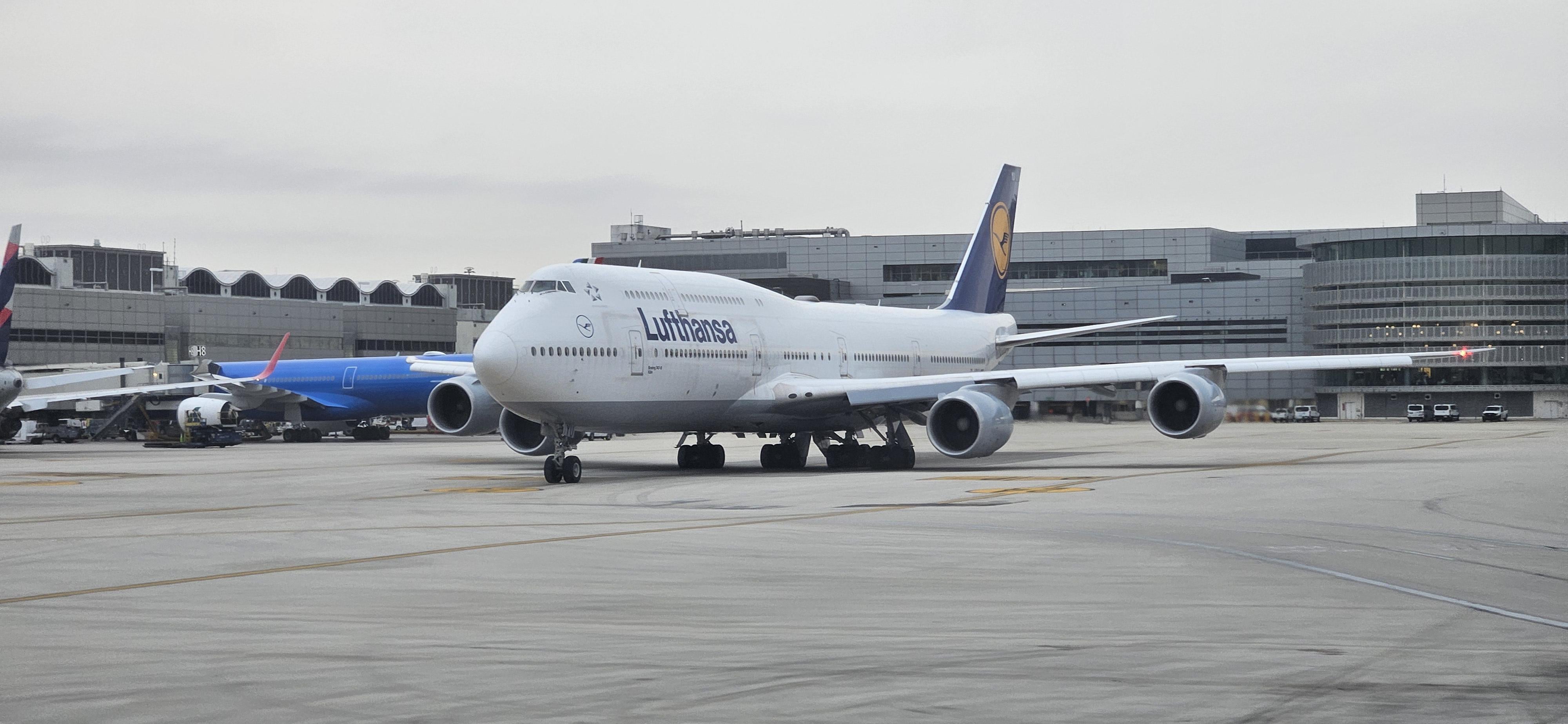 A Lufthansa Boeing 747-8 preparing for departure from Miami