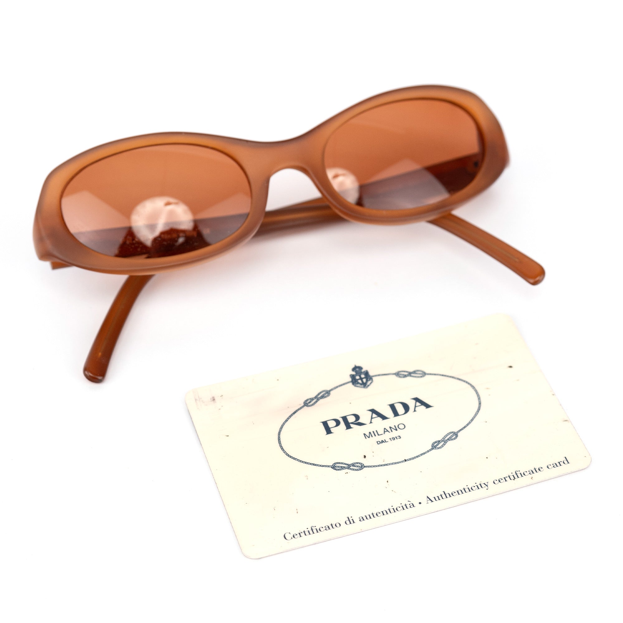 Spring 1999 Translucent Orange Oval Sunglasses – Rediscover Vintage