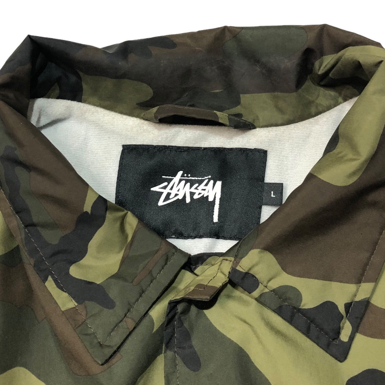 STUSSY(ステューシー) Stock logo camouflage coach jacket ストック