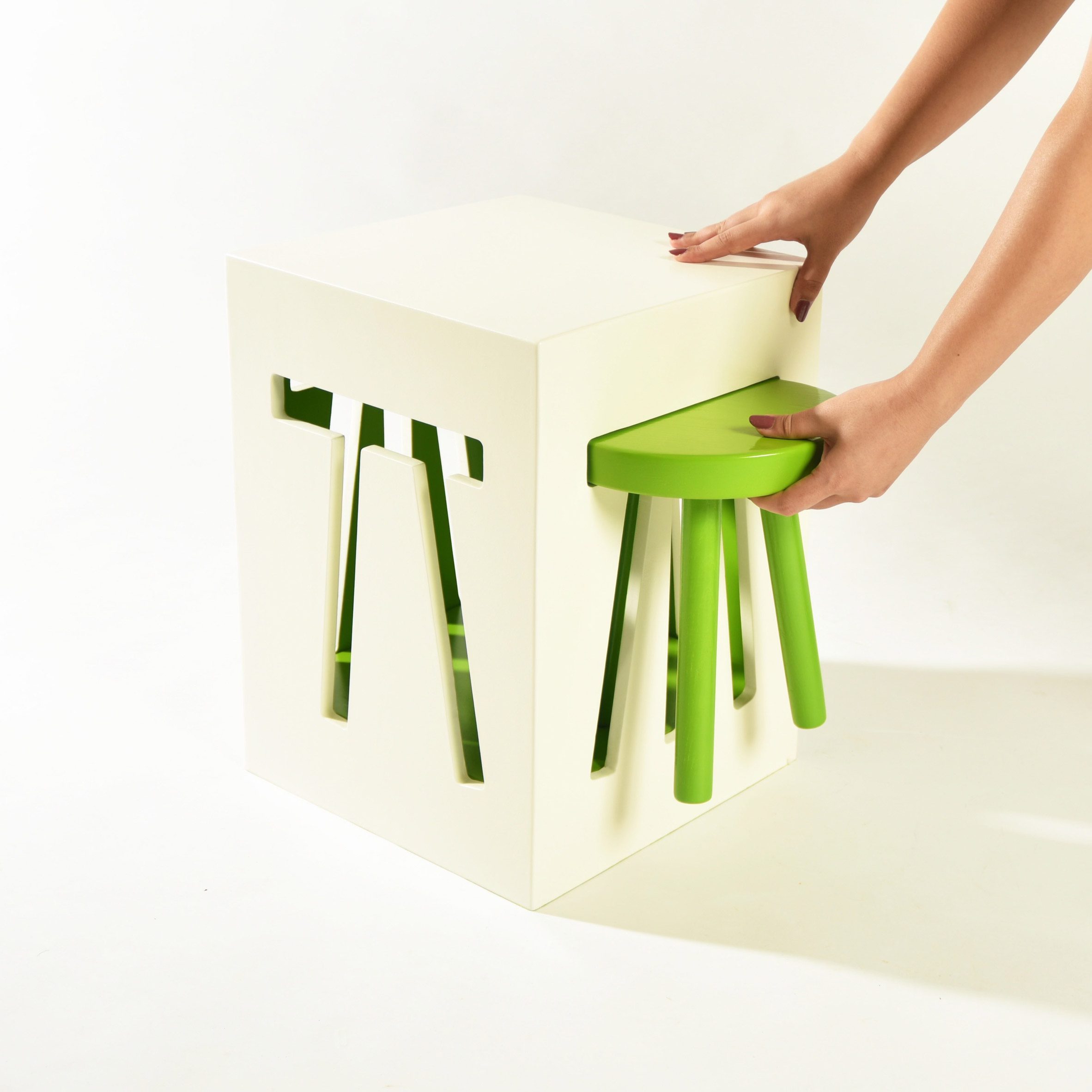 A stool among designs from Okinawa Prefectural University of Arts