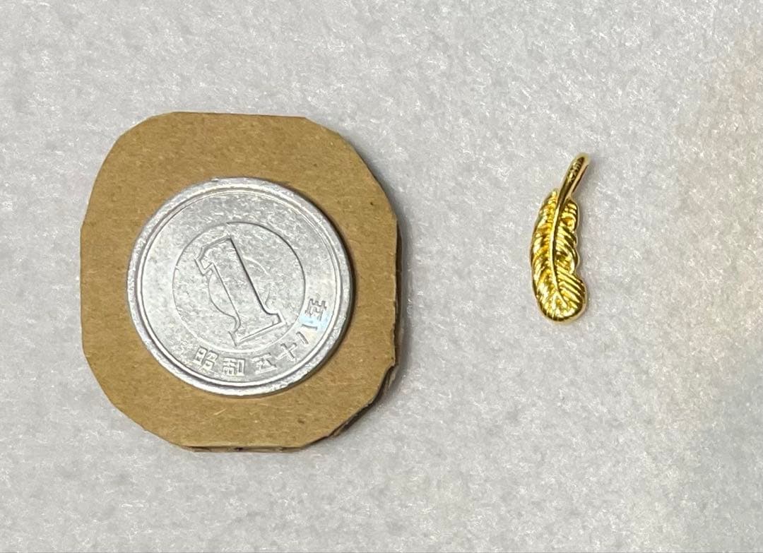K24 羽根のペンダントトップ 約15mm 足金999刻印 - メルカリ