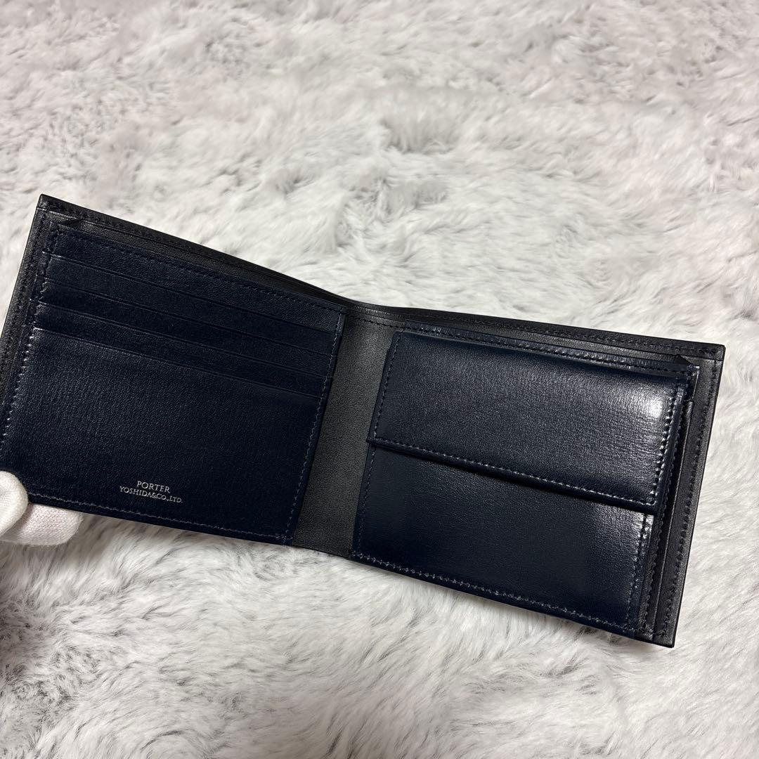 ポーター プリュム 二つ折り財布 ロゴプレート ネイビー レザー - メルカリ