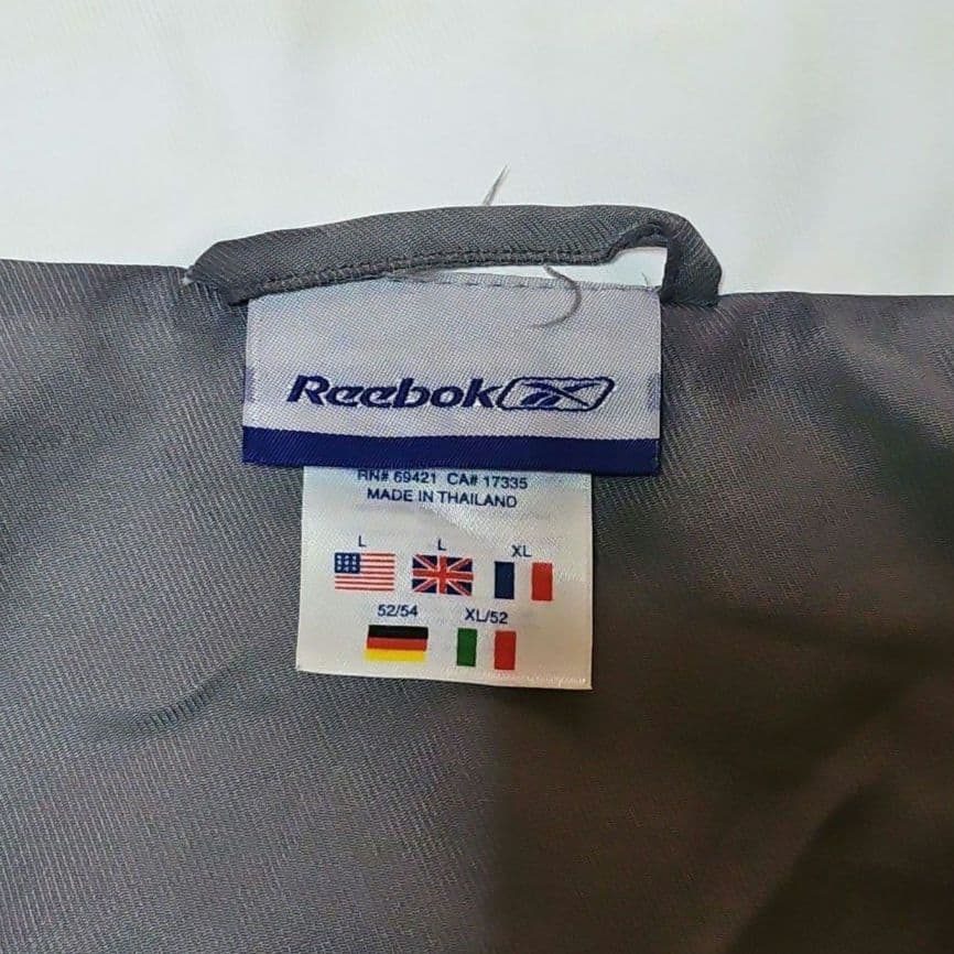 90s Reebok リーボック ナイロンジャケット 刺繍ロゴ 万国旗タグ XL